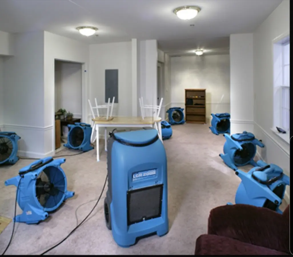 Air movers and dehumidifier setup for Water Damage Restoration in Savage